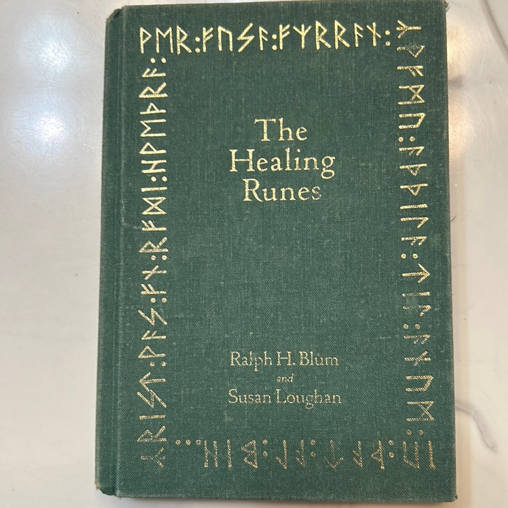 The Healing Runes book with velvet green bag.